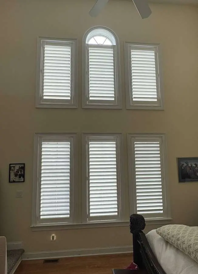 Custom shutters installed in a Carolina bedroom