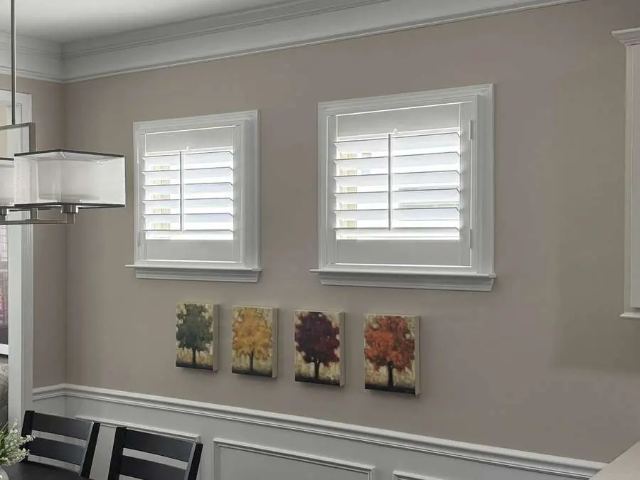 Plantation shutters installed in a Carolina dining room